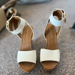 Never warn white wedge heels